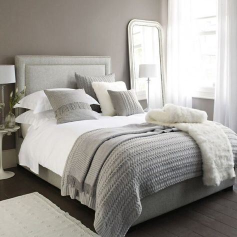 a simple neutral bedroom with taupe walls, neutral furniture, layered bedding, a mirror and lamps plus a neutral rug Neutral Bedroom Design, Bedroom Designs For Couples, Neutral Bedrooms, Bedroom Decor Cozy, Grey Bedroom, Woman Bedroom, Neutral Bedroom, Couple Bedroom, Trendy Bedroom