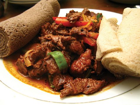 Special tibs (marinated beef) with injera | Flickr - Photo Sharing! Tibs Ethiopian Food, Tibs Ethiopian, Injera Recipe, Ethiopian Dishes, Ethiopian Recipes, Ethiopian Cuisine, Ethiopian Food, Baby Workout, Marinated Beef