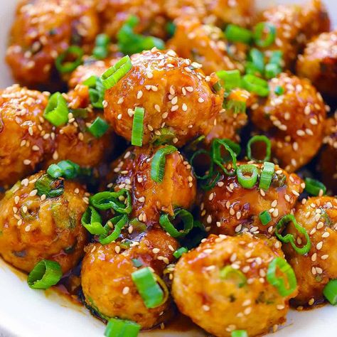 These easy Asian Chicken Meatballs with garlic, ginger, and green onion are smothered in a sweet and sticky soy sesame sauce and come together in 30 minutes! Asian Inspired Chicken, Asian Hot Sauce, Easy Asian Chicken, Asian Chicken Meatballs, The Cozy Cook, Cooked Pineapple, Low Calorie Chicken, Buffalo Chicken Meatballs, Chicken Balls