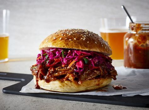 For an easy barbecue chicken recipe, try using your slow-cooker. This no-fuss version is just as delicious as a classic grilled barbecue chicken, and works well in sandwiches or as a popular summer main course. Honey Barbecue Chicken, Asian Pulled Pork, Burnt Honey, Honey Barbecue Sauce, Barbecue Sandwiches, Barbecue Chicken Recipe, Honey Barbecue, Sweet Chicken, Pork Sandwich