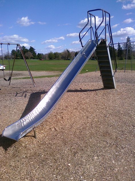 Metal playground slide. It burn your behind if the sun was on it for long enough Metal Playground, Playground Slides, Playground Slide, Basketball Courts, Metal Slide, Quality Memes, Tennis Courts, Winston Salem, Football Field