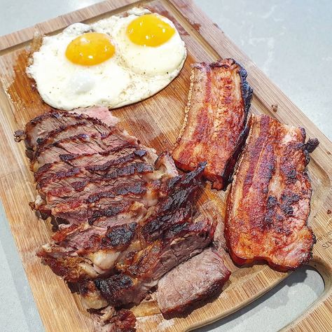 Up and at 'em folks, it's breakfast time! How about bacon, eggs AND ribeye? 😋 🥚 🥚 📸 @danketoman 🤩BREAKFAST🤩 🍽Ribeye, bacon & eggs🍽 🤤🥩🥓🍳❤💪🏽 🥚 🥚 #danketoman #steakandeggs #🥚 #bbqbreakfast #ketofood #ketosis #bacon #pancakes #steak #barbeque #asado #churrasco #sizzle #paleo #meatlover #brisket #beefbrisket #eggs #bbq #breakfast #breakfastofchampions #bbqeggs #bbqlads #bbqtime #foodlover #wakeup #eggpop 🥚 🥚 🤙 Tag your breakfast buddies! 🤙 Fatty Steak, Steak And Eggs Breakfast, Gym Foods, Bbq Breakfast, Ancestral Diet, Steak Breakfast, Bacon Pancakes, Country Breakfast, Breakfast Meat