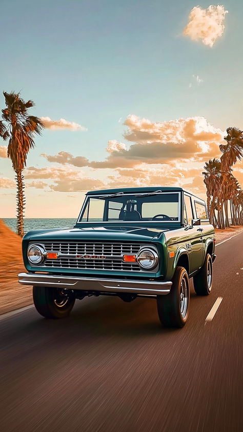 A classic dark green Ford Bronco drives along a sandy beach road at sunset, with ocean waves crashing in the background. Vintage Ford Bronco Aesthetic, Ford Bronco Aesthetic, Bronco Aesthetic, Ford Aesthetic, Vintage Ford Bronco, Old Ford Bronco, Vintage Bronco, Bronco Ford, Classic Bronco