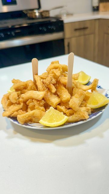 Giovanni Siracusa on Instagram: "🦑 Crispy Calamari Strips🌟 Save this Recipe!

Who said Fried Calamari needs to be Rings? Perfect for a quick snack or a delightful appetizer. 🍋✨

**Ingredients:**
- 1 pound calamari 🦑
- 1 cup 00 flour 🌾
- 1 cup semolina flour 🌼
- Sunflower oil or peanut oil for frying 🛢️
- Salt to taste 🧂
- Lemon wedges for serving 🍋

**Instructions:**

1. **Clean & Prep** 
Begin by thoroughly cleaning the calamari under running water. Take scissors, cut the tube open, then into half, and finally into strips for that perfect bite. 💧✂️

2. **Flour Coating** 
Mix the 00 flour and semolina flour in a bowl. Coat each calamari strip evenly in the flour mixture, ensuring a light but thorough coverage for that ultimate crispy finish. 🥣

3. **Fry to Perfection** 
Heat sun Crispy Calamari, Semolina Flour, Fried Calamari, Quick Snack, Peanut Oil, Lemon Wedge, Frying Oil, Calamari, Running Water