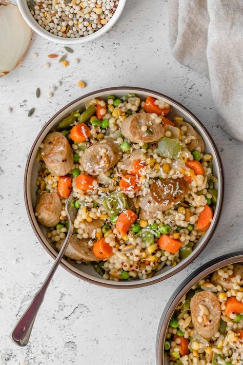 This easy One Pot Sausage and Couscous is the perfect weeknight meal. Chicken sausage, pearl couscous, and a medley of vegetables makes this dish healthy & satisfying. Customize it to your liking & the best part is that it only takes 30 minutes! Dairy free. One Pot Sausage, Pearl Couscous, Bbq Side Dishes, Sausage Dishes, Couscous Recipes, Sausage Soup, Easy One Pot Meals, One Pot Chicken, Best Side Dishes