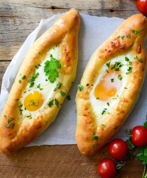 This Khachapuri recipe is a crowd-please. Get a step-by-step easy recipe of these delicious Khachapuri Adjaruli - traditional Georgian Cheese Flatbread topped with en egg. Khachapuri Recipe, Best Eggplant Recipe, Pork Kebabs, Georgian Cuisine, Georgian Food, Cheese Flatbread, Vegetarian Main Dishes, Party Appetizer, Eggplant Recipes