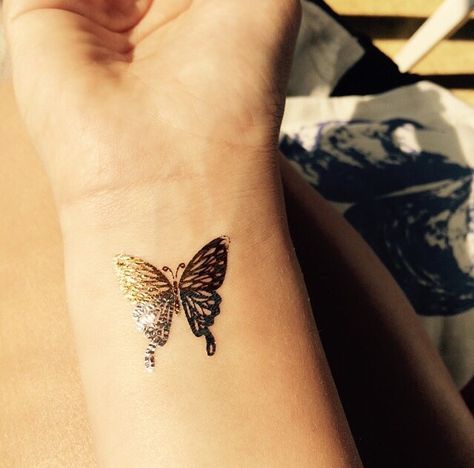 Butterfly tattoo in silver and gold Gold Butterfly Tattoo, Rose Gold Butterfly, Gold Butterfly, Rose Tattoo, Butterfly Tattoo, Lotus Flower Tattoo, Silver And Gold, I Tattoo, Cool Tattoos