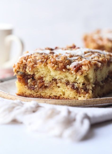 This Pecan Sour Cream Coffee Cake is an ultra moist cake with a delicious cinnamon pecan streusel baked inside and on top! Drizzle with a little icing and you have the perfect breakfast cake! #cookiesandcups #coffeecake #crumbcake #pecancoffeecake #sourcreamcoffeecake Coffee Cake Bars, Pumpkin Coffee Cake Recipes, Homemade Cheez Its, Coffee Cake Cookies, Pecan Coffee Cake, Breakfast Cake Recipes, Pumpkin Coffee Cake, Cups Recipes, Cookies And Cups