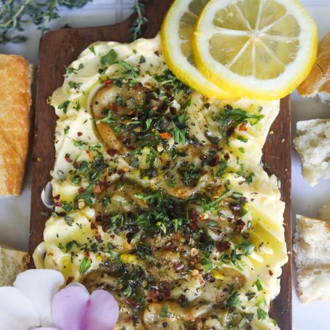 Garlic, Lemon & Herb Butter Board - Seasoned to Taste Lemon Herb Garlic Butter Candle, Herb Butter Board, Lemon Herb Butter, Butter Boards, Trendy Recipes, Butter Board, Roasted Garlic Cloves, Wine Butter, Garlic Herb Butter