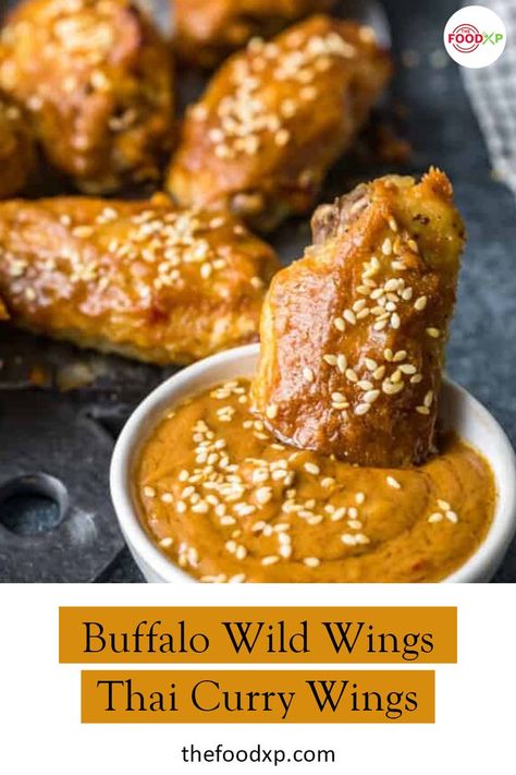 Try this Buffalo Wild Wild Wings Thai Curry if you are craving some creamy and spicy chicken curry. You can serve this with rice or salad for a quick and easy weeknight dinner. Click on the link here to view the recipe on our website. #buffalowildwingsthaicurrywings #buffalowildwingsthaicurrywingsrecipe #buffalowildwingsrecipes #thaicurrywingsrecipes Curry Wings Recipe, Curry Wings, Spicy Thai Curry, Buffalo Wild Wings Sauces, Thai Curry Sauce, Chicken Wing Recipes Fried, Fried Wings, Hot Wing Recipe, Wing Sauce Recipes