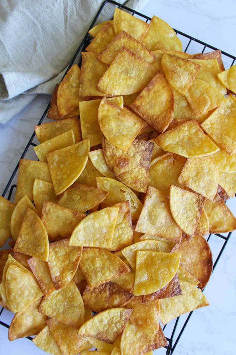 Ever wondered how to make homemade tortilla chips? It’s easier than you think, and it only requires 3 simple ingredients. Baking Tortillas Into Chips, Home Made Chips Tortilla, Homemade Tortilla Chips From Corn Tortillas, Making Chips Out Of Corn Tortillas, Chilaquiles Recipe, How To Make Tortillas, Homemade Tortilla Chips, Tacos And Burritos, Homemade Tortillas