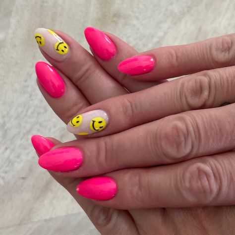 Neon pink nails with one smiley face finger. Preppy Nails With Smiley Face, Happy Face Nails Acrylic, Round Neon Nails, Smile Face Nail Art, Hot Pink Nails With Smiley Face, French Nails With Smiley Face, Happy Face Nail Designs, Pink Nails Smiley Face, Hot Pink Smiley Face Nails