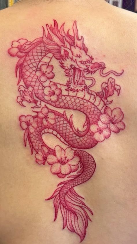 Red Animal Tattoo, Red Dragon Hip Tattoo, Dragon And Flower Tattoo For Women, Dragon Tattoo Flowers, Dragon With Cherry Blossom Tattoo, Pink Ink Tattoos, Dragon Chest Tattoo Female, Pink Dragon Tattoo, Red Dragon Back Tattoo