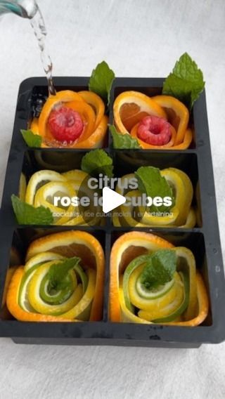 Erin Silberman on Instagram: "Citrus Rose Ice Cubes

•Follow @seriousfoodfetish for more recipes, restaurant recs & food trends•

Labor Day weekend is right around the corner and these citrusy ice cubes will not only look cute in your drinks, but will add flavor once they start to melt. Add to your cocktail, mocktail, or ice cold glass of lemonade.

Ingredients
* 2 oranges
* 2 lemons
* 2 limes
* Lemonade
* Seltzer
* Raspberries
* Mint 
* Medium or Large Silicone Ice Cube Mold Trays

Recipe
1. Slice citrus in half. Then, slice each half again. You should have 4 sections. 
2. Slice the citrus so it’s thin enough to bend. Repeat with all citrus.
3. To layer - start by bending the citrus & placing in a corner of one of the silicone cube compartments. Keep layering until you have a little bit o Citrus Rose Ice Cubes, Cocktail Ice Cubes, Rose Ice Cubes, Lemonade Ingredients, Fancy Ice Cubes, Lime Lemonade, Fancy Ice, Recipes Restaurant, Decorações Com Comidas