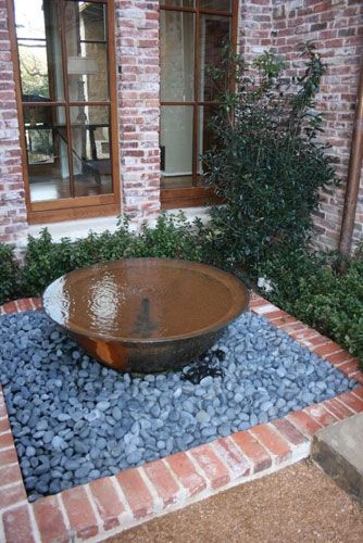 A sugar kettle water feature. Striking and easy to create... even nicer as a fountain! | #WaterFeature #ContainerWaterGardens Landscaping With Fountains, Diy Solar Fountain, Container Water Gardens, Outdoor Water Features, Garden Water Feature, Pond Water Features, Solar Fountain, Backyard Water Feature, Water Fountains Outdoor