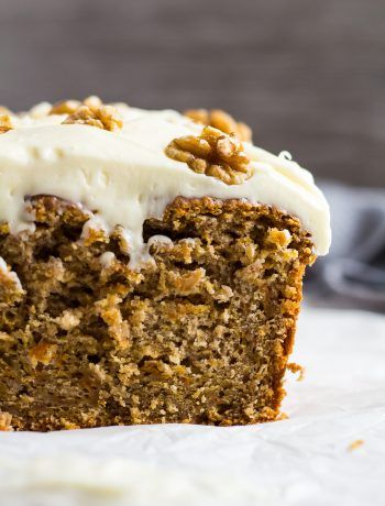 A close-up shot of half a Carrot Cake Loaf topped with a thick layer of cream cheese frosting. Thick Cream Cheese Frosting, Carrot Cake Loaf Recipe, Carrot Cake Loaf, Healthy Carrot Cake, Homemade Carrot Cake, Cake Loaf, Carrot Spice Cake, Spiced Carrots, Moist Carrot Cakes