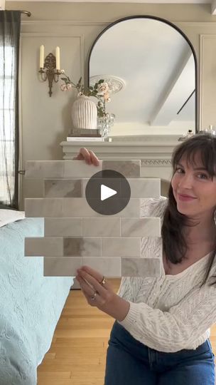 129K views · 1.6K reactions | #ad Let’s add some tile in a renter-friendly way! These tiles aren’t your ordinary peel and stick tile… they’re real marble tiles but don’t require grout or mortar making installation super quick and simple. I had two spots in mind for these 1) to add some dimension inside of one of the decorative faux fireplace surrounds and 2) to add a backsplash to our makeshift kitchen area. The peel and stick tile in Daltile’s Xpress Mosaix line x @The Home Depotis such a good option if you’re wanting to make a quick update to the tile in your home or have an area that could use tile. Tip for renters: I attached it to a poster board for an easy removal later on! #HomeDepotPartner #THDXpressMosaix#XpressMosaix #PeelNStickTile #THDdaltile #easyinstalltile | Prettyinthepines Peel And Stick Over Ceramic Tile, Groutable Peel And Stick Tile, Makeshift Kitchen, Faux Tiles, Bathroom Hacks, Peel N Stick Backsplash, Faux Fireplace, Peel And Stick Tile, Marble Tiles