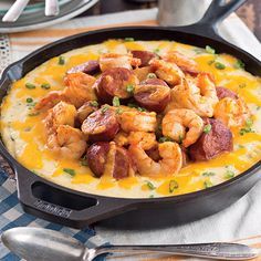 This Louisiana classic, Baked Creole Shrimp and Grits, is a flavorful dish with Andouille sausage, shrimp, cheese, spices, and butter. The traditional sausage in the recipe has a kick to it, so feel free to use a milder smoked sausage to keep the heat level down. Creole Shrimp And Grits, Creole Shrimp, Shrimp N Grits Recipe, Shrimp Creole, Grits Recipe, Shrimp And Grits, Shrimp N Grits, Shrimp Dishes, Andouille Sausage