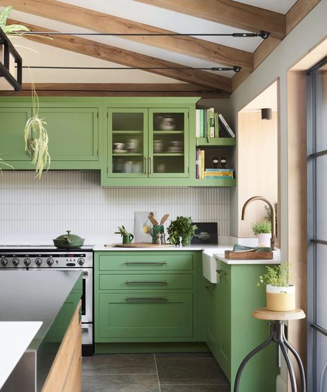 It really is each to their own with bolder shades in the kitchen. If you love a bright green and you know you personally won't tire of it then go for it – this slightly more muted green kitchen is so fabulous. But just always consider how you will feel about your kitchen color in five years' time, or ten years' time because that is potentially how long you will have to be around this color and there is the risk you will grow sick of it or it will date quickly. Image credit: Roundhouse Bright Green Cabinets, Green Cabinets Kitchen, Small Kitchen Colors, Cabinet Color Ideas, Kitchen Cabinet Color, Outdated Kitchen, Kitchen Colour Combination, Kitchen Cabinet Color Ideas, Bold Kitchen