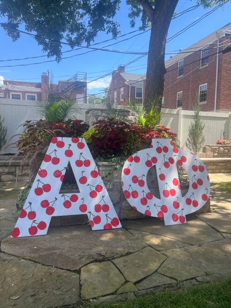 sorority bid day alpha phi cherry theme flower picnic recruitment rush week work week theme Cherry On Top Sorority Theme, Cherry Recruitment Theme, Cherry On Top Bid Day Theme, Miss American Pie Bid Day, Bid Day Activities, Cherry On Top Bid Day, Cherry Bid Day Theme, Unique Bid Day Themes, Greek Letters Painted