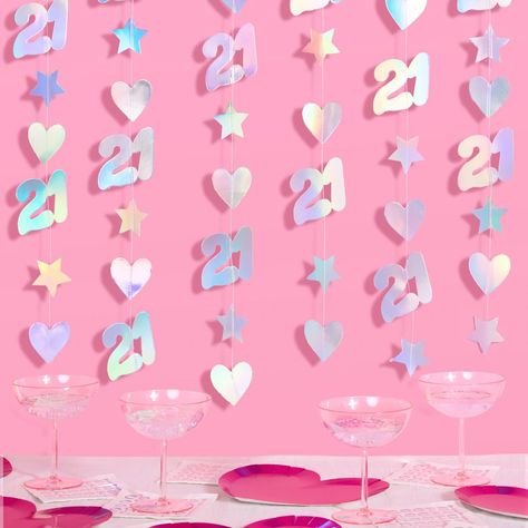 PRICES MAY VARY. HBD: Our iridescent paper foil 21st bday garland is the party addition you've been looking for and a guaranteed hit! Foil details: Each paper garland features icons of 21, stars + hearts. The finish feels very luxe and is the perfect banner to compliment your event. For that special day: One size fits all! Perfect for any 21st birthday girl or boy! Star quality: Our iridescent foil paper garland is made of high quality paper and is held together by super sturdy string making it Fun Birthday Party Decorations, Backdrop 21st Birthday, 21st Birthday Decor, Fun Birthday Party, Hanging Garland, Cute Photo, Photo Booth Backdrop, Birthday Decor, Photo Backdrop