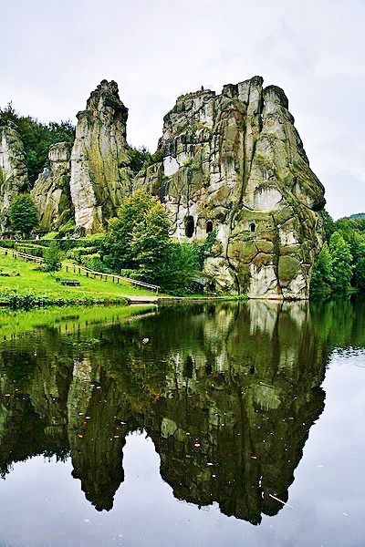 Externsteine: Germany's Sacred Stone Formation- an incredible site with history… Nature Wonders, Wonderful Nature, Sacred Stones, The Reflection, Stone Age, Sacred Places, Rock Formations, The Stone, Germany Travel