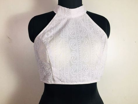 DESCRIPTION Item:- Halter neck blouse Material: Cotton Design Type:- Indian Size:- 32-38 inches Quantity:- 1 Blouse Country of Origin:- India Wash Instruction:- Dry Clean Only Halter Neck Blouse Design, Blouse Backless, White Blouse Designs, Halter Neck Blouse, Blouse Tops Designs, Halter Neck Blouses, Blouse Designs High Neck, Long Gown Design, Backless Blouse Designs