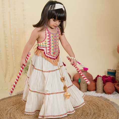 🌟 Cream Classic Lehenga Choli for Baby Girls🌟 Available from 6 months to 10 years! This festive season, dress your little princess in elegance and comfort with our exquisite designs. ✨ Product Highlights: -Pure Handloom Fabrics -Baby Friendly Accessories -Rich Thread Embroidery -Halter Neckline with Adjustable Back -Long Flares Skirt -Comfortable elastic on waist Why settle for less when your little one can shine in our uniquely designed, comfortable, and stylish Lehenga Choli? This Fes... Baby Girl Choli Design, Baby Choli Designs, Baby Girl Indian Dress, Baby Lehenga Designs, Classic Lehenga, Long Flare Skirt, Garba Navratri, Baby Lehenga, Stylish Lehenga