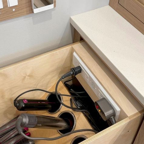 Docking Drawer™ on Instagram: "Say goodbye to countertop clutter! ✨ David transformed his vanity with Docking Drawer, eliminating device and cord chaos. With the Blade Duo outlet paired with 3" Docking Drawer canisters, hot styling tools are neatly stowed away, even when in use. Inspired by our project gallery, David maximized space, creating a cleaner, more convenient setup. Discover how Docking Drawer can streamline your space today! #OrganizationGoals #BathroomStorage #Declutter #DockingDrawer #HomeOrganization" Hot Tools Vanity Drawer, Hair Appliance Drawer, Hair Tools Drawer, Docking Drawer, Bathroom Outlet, Built In Vanity, Vanity Makeup Table, Tool Drawers, Epping Forest