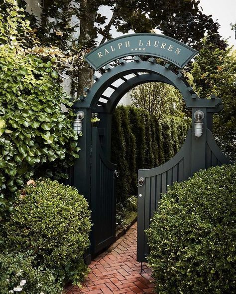 Ralph Lauren Home | A welcoming garden with a decorative brick path leads to our quaint Home Cottage in the heart of Southampton. #RalphLaurenHome | Instagram Ralph Lauren Garden, Garden Arbor Ideas, White Picket Fence Ideas, Garden Pathway Ideas, Arbor Gate, Pathway Decor, Picket Fence Ideas, Pathway Ideas, Garden Gate Design