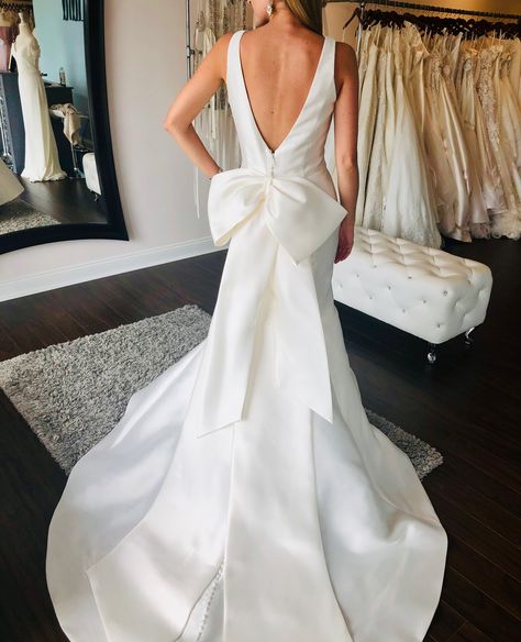 Wedding Dress With Ribbon Back, Wedding Gown With Ribbon At The Back, Modern Architectural Wedding Dress, Silk Bow Wedding Dress, Wedding Dress Back Bow, Satin Wedding Dress With Bow On Back, Wedding Dresses Bow On Back, Wedding Dresses With Bow On Back, Wedding Dress Bow On Back