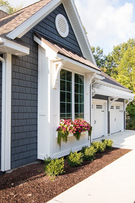 Lake House Exterior - Dark grey charcoal vinyl shake siding with white trim, pergola, window boxes and corbel details. Coastal Farmhouse Exterior, Small Cottage Designs, Lake Houses Exterior, Farmhouse Exterior Design, Shake Siding, Small Cottages, Cottage Exterior, Casas Coloniales, Modern Farmhouse Exterior