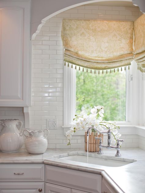 White Traditional Kitchen, Corner Kitchen Sink, Window Over Sink, Kitchen Window Valances, Kitchen Sink Window, White Tile Backsplash, Corner Sink Kitchen, Corner Kitchen, Corner Window