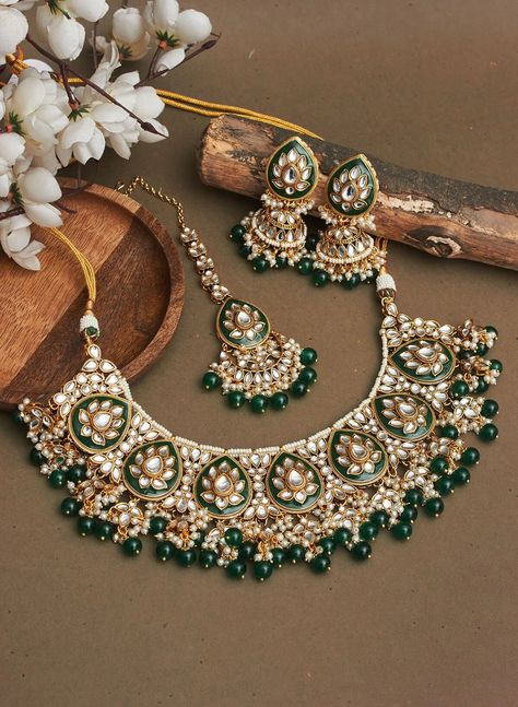 Adorn yourself with exquisite Bridal Kundan Jewellery in stunning shades of green and off white pearls. This Wedding jewellery, inspired by Indian and Pakistani traditions, features intricate designs including Jhumka earrings, Maangtika (forehead ornament), and Punjabi-inspired elements.  With vibrant ivory accents and green Meenakari work, this jewellery set is the perfect complement to your Indian wedding ensemble, radiating timeless beauty and capturing the essence of cultural heritage. Item includes: Necklace, earrings and maangtika Ready to be shipped with love from New Delhi, India  Please leave your phone number in notes or message when placing order for this item. Green Ivory Wedding, Bridal Kundan Jewellery, Green Jewellery Set, Wedding Jewellery Indian, India Necklace, Wedding Pearls, Wedding Planner Checklist, Kundan Jewellery Bridal, Green Themed Wedding