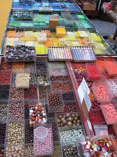 Bead Heaven at Marche Dauphine | Another vintage bead seller… | Flickr Bead Storage Ideas, Thrift Store Diy Projects, Indoor Markets, Thrift Store Diy, Bead Collection, Bead Studio, Chanel Runway, Bead Organization, Ways To Organize