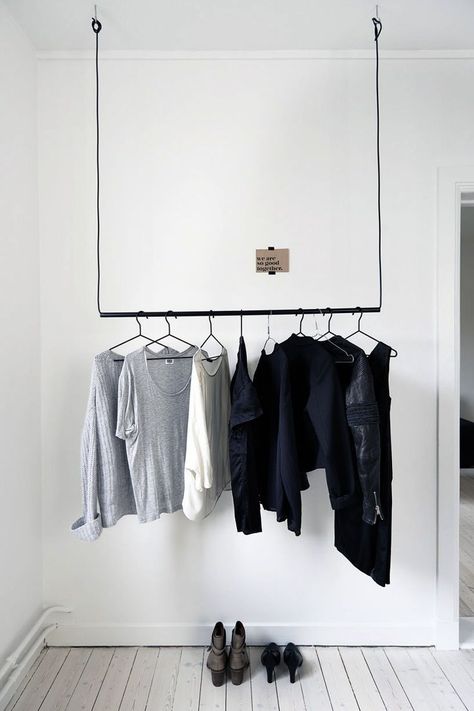 Simple hanging pole with wire to hang clothing Clothes Hanging, Deco Studio, Dekorasi Kamar Tidur, Clothes Rail, Hanging Clothes, Wardrobe Closet, Clothes Closet, Closet Space, Retail Design