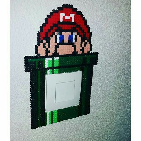 Mario perler bead light switch frame Light Switch Frame, Hama Beads Mario, Hama Mario, Scene Kid Art, Perler Bead Mario, Modele Pixel Art, Nerd Crafts, Pastel Beads, Fusion Beads