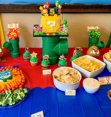 Mario Kart Birthday Party Food Ideas, Mario Birthday Party Drinks, Yoshis Crafted World Party, Mario Party Dessert Ideas, Super Mario Brothers Food Ideas, Mario Brothers Birthday Party Ideas Food, 1up Birthday Party, One Year Old Mario Party, Mario Party Snack Ideas