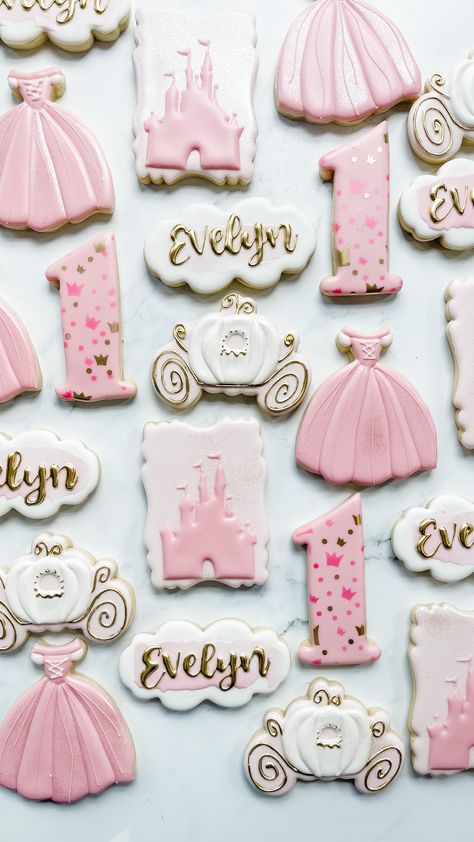 Fairytale Party Centerpieces, First Birthday Party Princess Theme, Once Upon A Time Decorated Cookies, 1st Birthday Princess Cookies, Pink Princess First Birthday Party, Royal Princess First Birthday Party, Royal Princess Party Ideas, Pink And Gold Princess Cookies, Aurora Sleeping Beauty Birthday Party Ideas