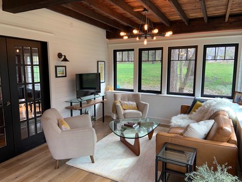 Sloped Ceiling Sunroom, Sunroom With Dark Ceiling, Cozy Four Seasons Room, Open Floor Joist Ceiling, Sunroom Remodel Before And After, Sunroom With Wood Ceiling, Sunroom With Bar, Sunroom With Shiplap Walls, Square Sunroom