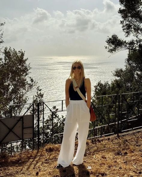 Jennifer Lawrence, Sienna Miller and Gwyneth Paltrow Are All Fans Of The White Trouser Trend | Who What Wear UK Gwyneth Paltrow Style, Linen Pants Style, Holiday In Italy, Holiday Capsule Wardrobe, J Law, Pretty White Dresses, Classic White Dress, Summer Items, Summer Trousers