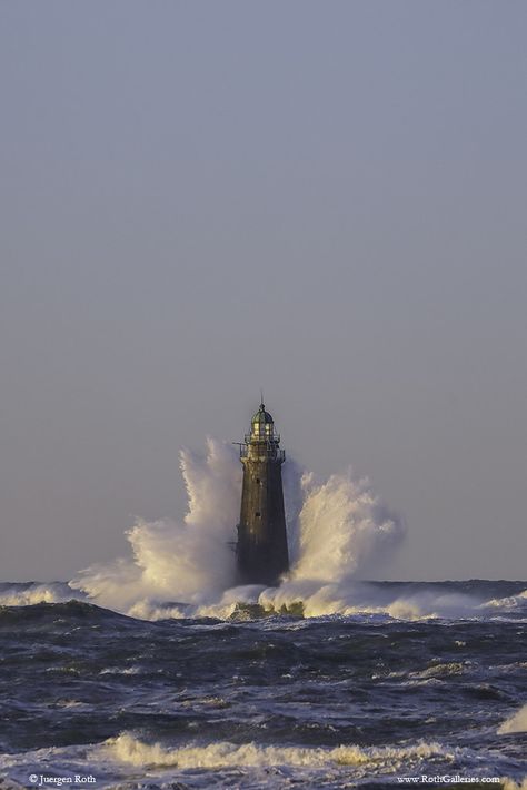 Minots Ledge Light standing strong and tall since 1860 one mile offshore of the towns of Cohasset and Scituate in Massachusetts. Each storm, waves pound Minots Light which make one wonder why this iconic New England lighthouse has not crumbled under the sheer force of Mother Nature yet. Good light and happy photo making! www.RothGalleries.com #lighthouse #fineartphotography #canon #massachusetts #newengland #lighthouseart #interiordesign #Minotslight #Minotsledgelight #artwork #mothernature Lighthouse Aesthetic Storm, Lighthouse Core, Lighthouse In A Storm, Lighthouse Aesthetic, Scituate Massachusetts, Storm Waves, New England Lighthouses, Nautical Aesthetic, Lighthouses Photography