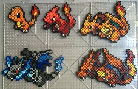 #004-#006 Charmander Family Perlers by TehMorrison on DeviantArt Charizard Perler Beads, Charmander Perler Beads, Hama Beads Pokemon, Pokémon Perler, 3d Pokemon, Mega Charizard, Pokemon Perler, Pokemon Bead, Perler Creations