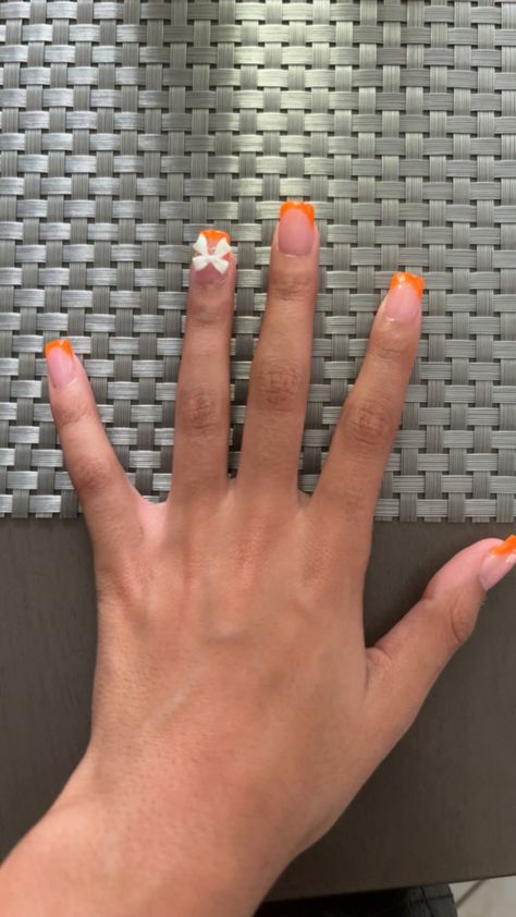 Lightskin hand style .. Orange French Tip, Orange Acrylic Nails, Hand Style, Bow Charm, Orange Bows, Short Acrylic Nails Designs, Orange Nails, White Bow, Short Acrylic Nails