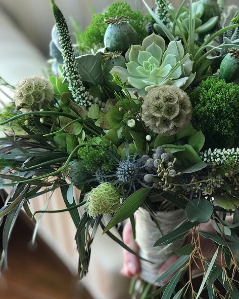 When I sat down with the bride, I showed her a lot of succulent bouquets. She liked them but she wasn’t in love with the look. She kept saying I want something very wild. I put a lot of other obscure accents like poppy pods, scabiosa pods, and white Veronica to add different textures and to create a more unique bouquet. Poppy Pods Bouquet, Outdoors Centerpieces, Succulent Bridal Bouquet, Succulent Wedding Bouquet, White Veronica, Scabiosa Pods, Succulent Bouquet Wedding, Green Weddings, Poppy Pods