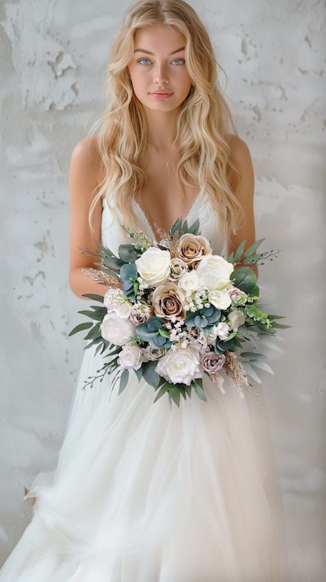 More beautiful wedding flowers https://bridalstoryus.etsy.com  Bridal wedding bouquet is created with high quality silk flowers. These handmade artificial wedding bouquets make beautiful additions to wedding and event floral arrangements. Flowers: peonies, roses, eucalyptus and fillers.  Colors: white, beige, taupe, green, white, pale champagne. Handle: wrapped in ivory satin ribbon. Size: bridal bouquet is approximately 14" wide, bridesmaids bouquet is 8". SUGGESTION: steaming the bouquets upon June Wedding Flowers, Bridesmaid Bouquet Alternatives, Tiana Wedding, Wedding Bouquet White, Bridal Bouquet White, Vintage Bridal Bouquet, Eucalyptus Wedding Bouquet, Rust Wedding, Green Wedding Bouquet