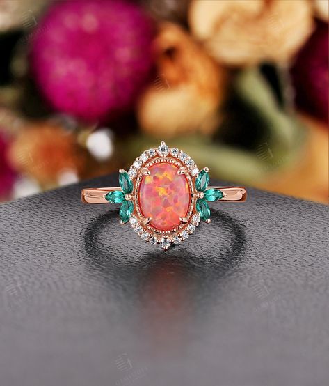 Guess your favorite Ring：https://www.etsy.com/listing/699139357 https://www.etsy.com/listing/938521537 ★ Settings ☆ Metal: 14K / 18K Solid Gold  ☆ Gold Color: Rose / White / Yellow ★ Main Stone ☆ Type: Lab Opal ☆ Shape: Oval Cut ☆ Size: 8*6 mm ★ Side Stones ☆ Type: Moissanite ☆ Total Carat Weight: approx 0.098 ct ☆ Shape: Round ☆ Color: DEF ☆ Clarity: VVS-VS ☆ Type: Lab Emerald ☆ Total Carat Weight: approx 0.162 ct ☆ Shape: Marquise ▷ Weight of gold: about 3.33 g ▷ Band width: 1.8 mm ▷ Band Thic Luxury Opal Ring With Accent Stones As Gift, Multicolored Engagement Ring Cheap, Luxury Opal Ring With Accent Stones For Engagement, Luxury Oval Opal Ring With Gemstone Accents, Luxury Opal Wedding Ring With Gemstone Accents, Luxury Opal Ring With Round Stone For Formal Occasions, Luxury Oval Opal Ring With Accent Stones, Luxury Round Cut Opal Ring With Accent Stones, Luxury Opal Ring With Center Stone As Gift