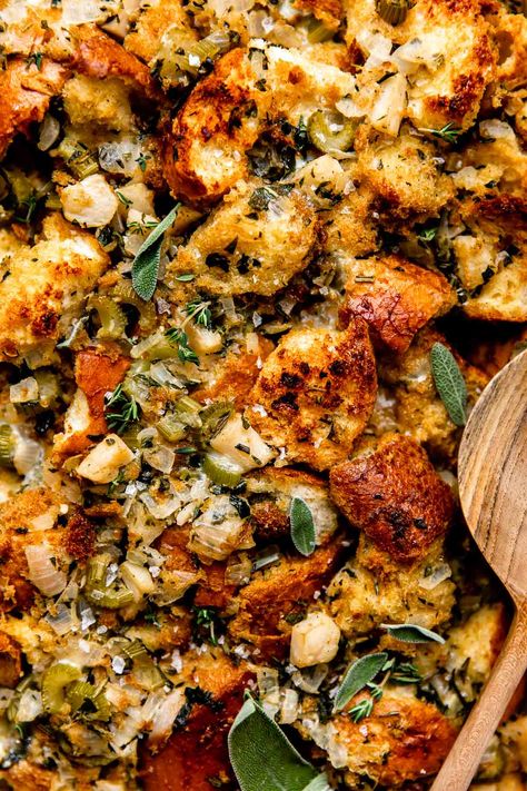 Make stuffing ahead of time this year for your easiest Thanksgiving yet! This Make Ahead Stuffing recipe is a classic mix of homemade bread cubes & aromatics, but loads of fresh herbs take it over the top! Prep it up to 3 days in advance, then bake until golden brown at dinnertime. Perfect to serve alongside roast turkey, mashed potatoes, & any other Thanksgiving side dishes you love. Easily vegetarian, vegan. #stuffingrecipes #makeaheadstuffing #thanksgivingrecipes #thanksgivingsidedishes Make Ahead Stuffing, Vegan Stuffing, 2023 Thanksgiving, Vegetarian Stuffing, Best Stuffing, Carb Sides, Homemade Stuffing, Stuffing Recipes For Thanksgiving, Thanksgiving 2023