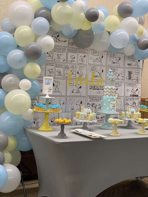 Blue,grey and yellow Snoopy themed baby shower | CatchMyParty.com Snoopy Baby Shower Decorations, Snoopy Baby Shower Theme, Peanuts Decor, Snoopy Baby Shower, Snoopy Baby, Light Blue Decor, Peanut Baby Shower, Baby Shower Party Themes, Snoopy Party