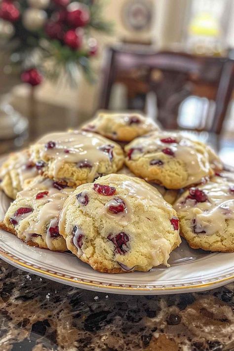 These Orange Cranberry Ricotta Cookies are incredibly soft, chewy, and full of fresh citrus flavor! With dried cranberries and a zesty orange glaze, they're the perfect treat for holidays or anytime you need a sweet, tangy snack. This easy recipe takes less than 30 minutes from start to finish. Save this pin and bake these irresistible cookies today! Orange Ricotta Cranberry Cookies, Orange Cranberry Ricotta Cheese Cookies, Cranberry Ricotta Cookies, Cranberry Orange Ricotta Cookies, Cranberry Lemon Cookies, Cranberry Cookies Recipes Dried, Orange Cranberry Ricotta Cookies, Recipes With Dried Cranberries, Fresh Cranberry Cookies